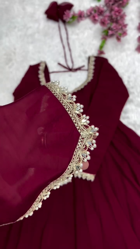 Women’s Elegant Maroon Anarkali-Style Ethnic Dress with Decorative Border | Graceful Long-Sleeve Festive Outfit