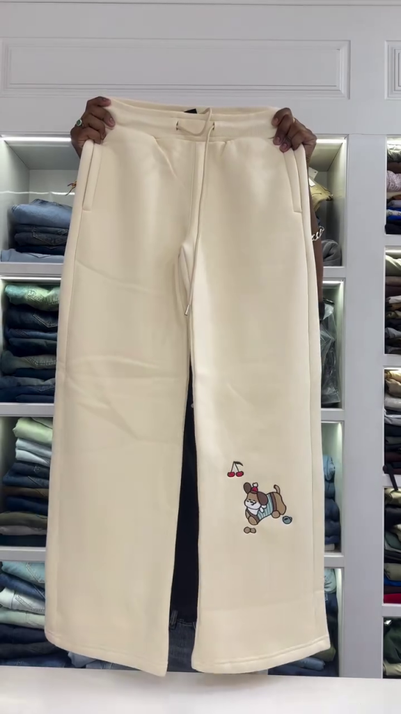 Women’s Elegant Ivory Cream Wide Straight-Leg Casual Trousers with Comfortable Drawstring Waist, Minimal Side Pockets, Relaxed Fit & Playful Embroidered Cartoon Character Detail for Trendy Everyday Fashion 🤍🐾✨