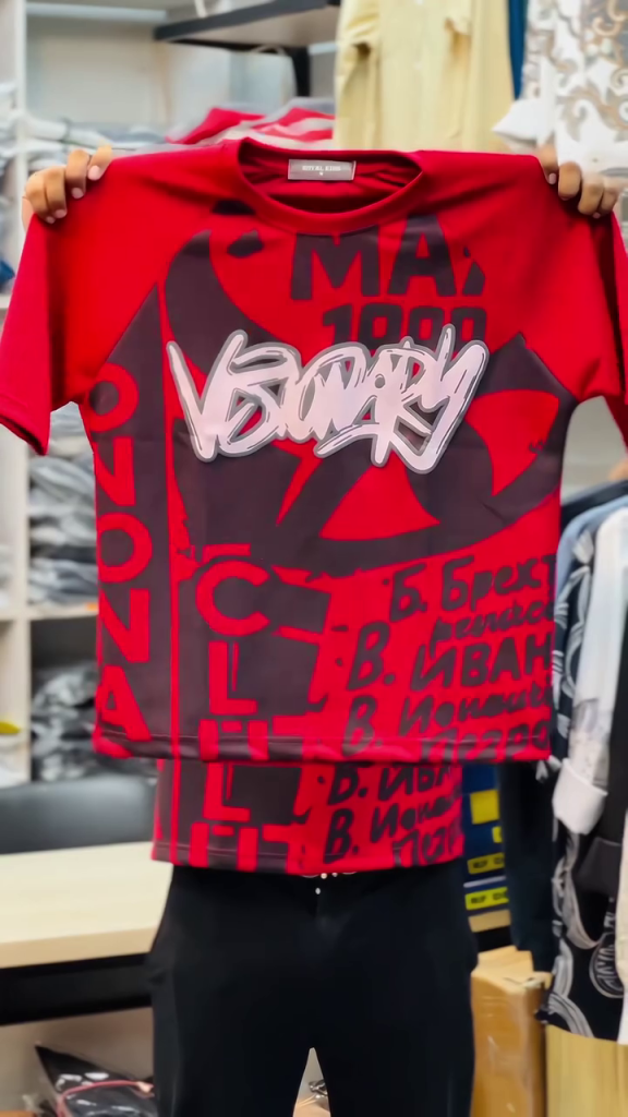 Men’s Bold Red Graphic Print Half-Sleeve T-Shirt with Contrasting Dark Abstract Typography, Oversized Front Artwork, Round Neckline and Contemporary Urban Streetwear Design