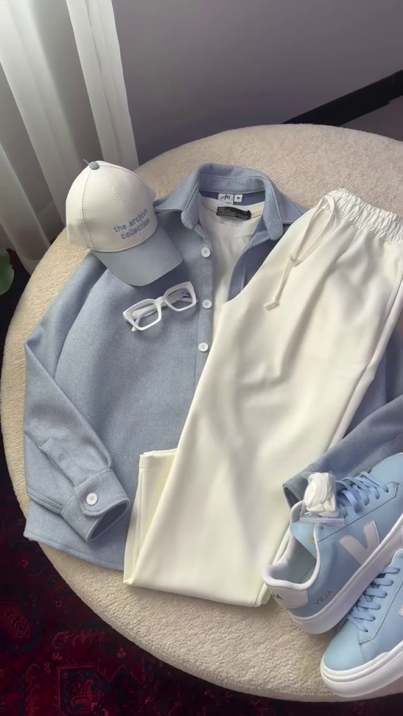 Men’s Sophisticated Light Blue Relaxed Button-Down Shirt Paired with Ivory White Drawstring Trousers, Minimal Collar Design, Long Sleeves and Clean Contemporary Casual Co-Ord Styling