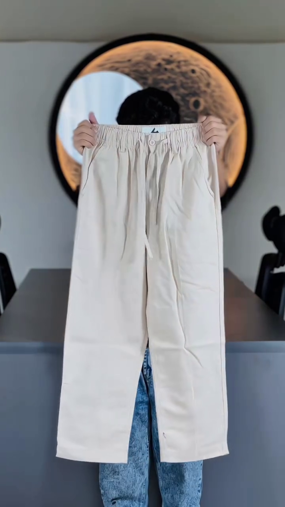 Elegant Beige Relaxed-Fit Straight-Leg Trousers with Elasticated Waistband, Adjustable Drawstring Closure, Front Button Detail, Side Pockets and Minimal Everyday Casual Design